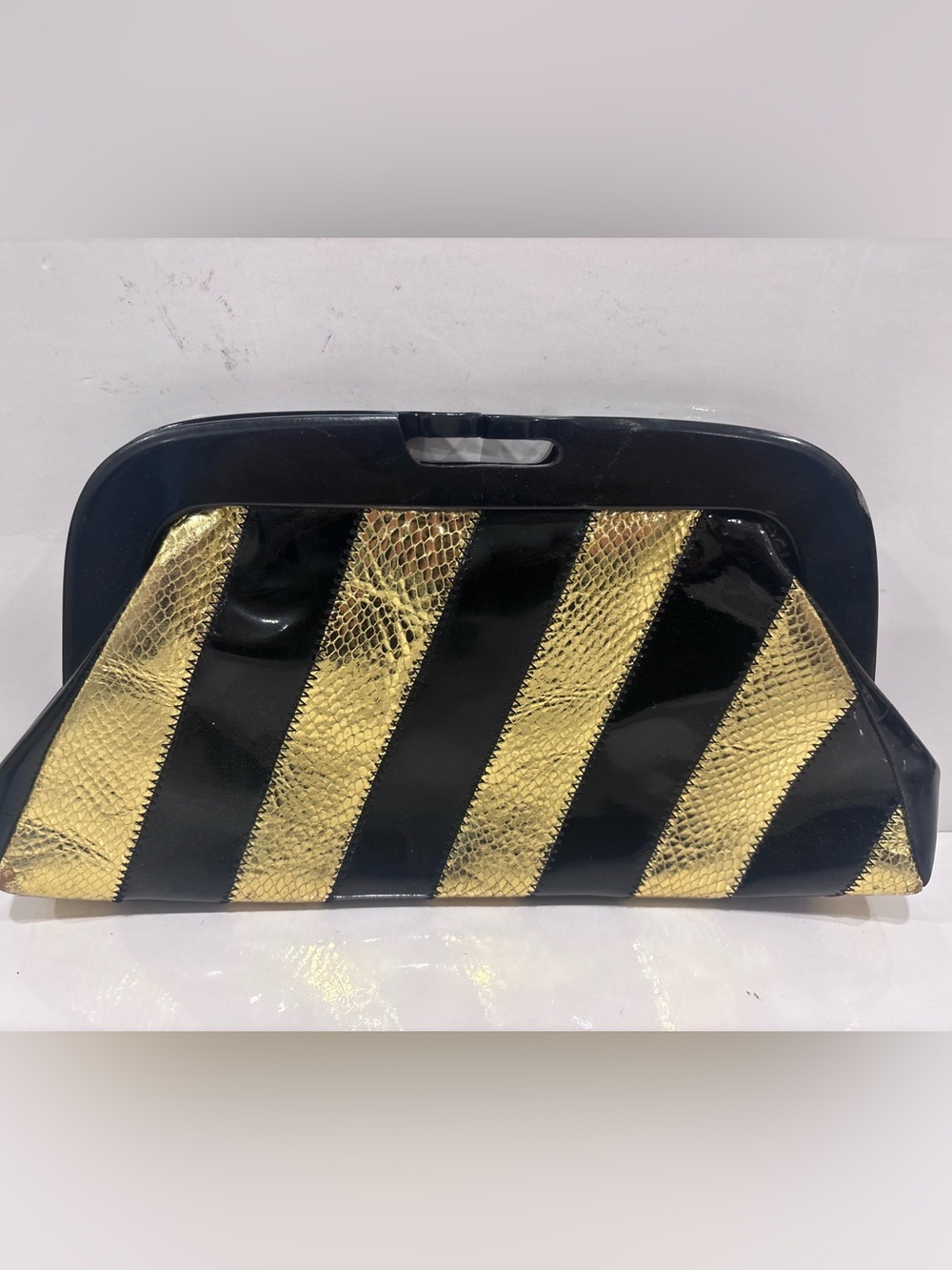 Marciano Black and Gold Diagonal Stripe Clutch
